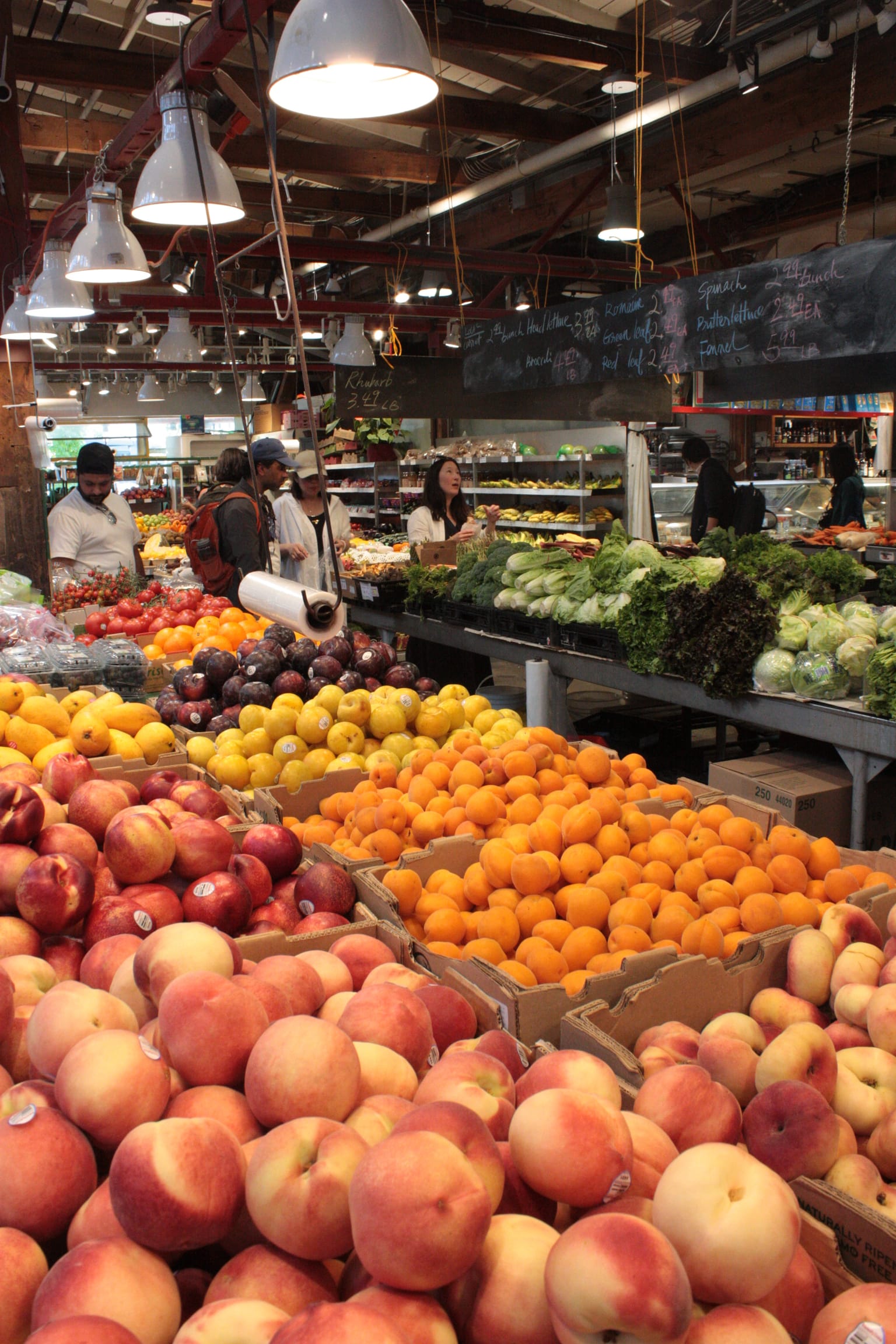 Fruit stands at Granville Island Public Market, Vancouver, July 2024